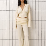 Straight pants with a decorative belt in Butter Yellow