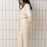 Straight pants with a decorative belt in Butter Yellow