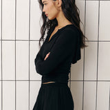 Long sleeve top with zipper and hood in Black