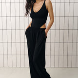 Bodysuit with a V-neckline and thin straps in Black