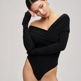 Bodysuit with a wrap front and gathers in Black