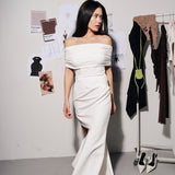 Топ зі спущеними плечима молочний