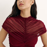 Mesh bandeau bodysuit with shoulder draping in Burgundy
