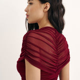 Mesh bandeau bodysuit with shoulder draping in Burgundy