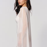 Semi-sheer cape in Milk