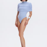 Draped cape with a stand-up collar in Light blue