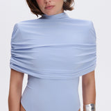 Draped cape with a stand-up collar in Light blue