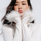 Top with rhinestones and feathers in Milk