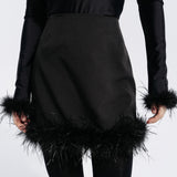 Mini skirt with feathers in Black