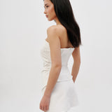Asymmetric corset top in Milk