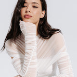 Mesh ruched sleeves in Milk