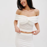 Top with a knot and off-shoulder design in Milk
