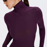 Bodysuit with a stand-up collar in Plum